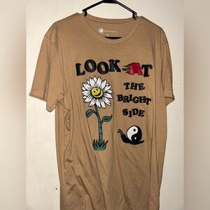 Tan Tee with Bright Graphic Design